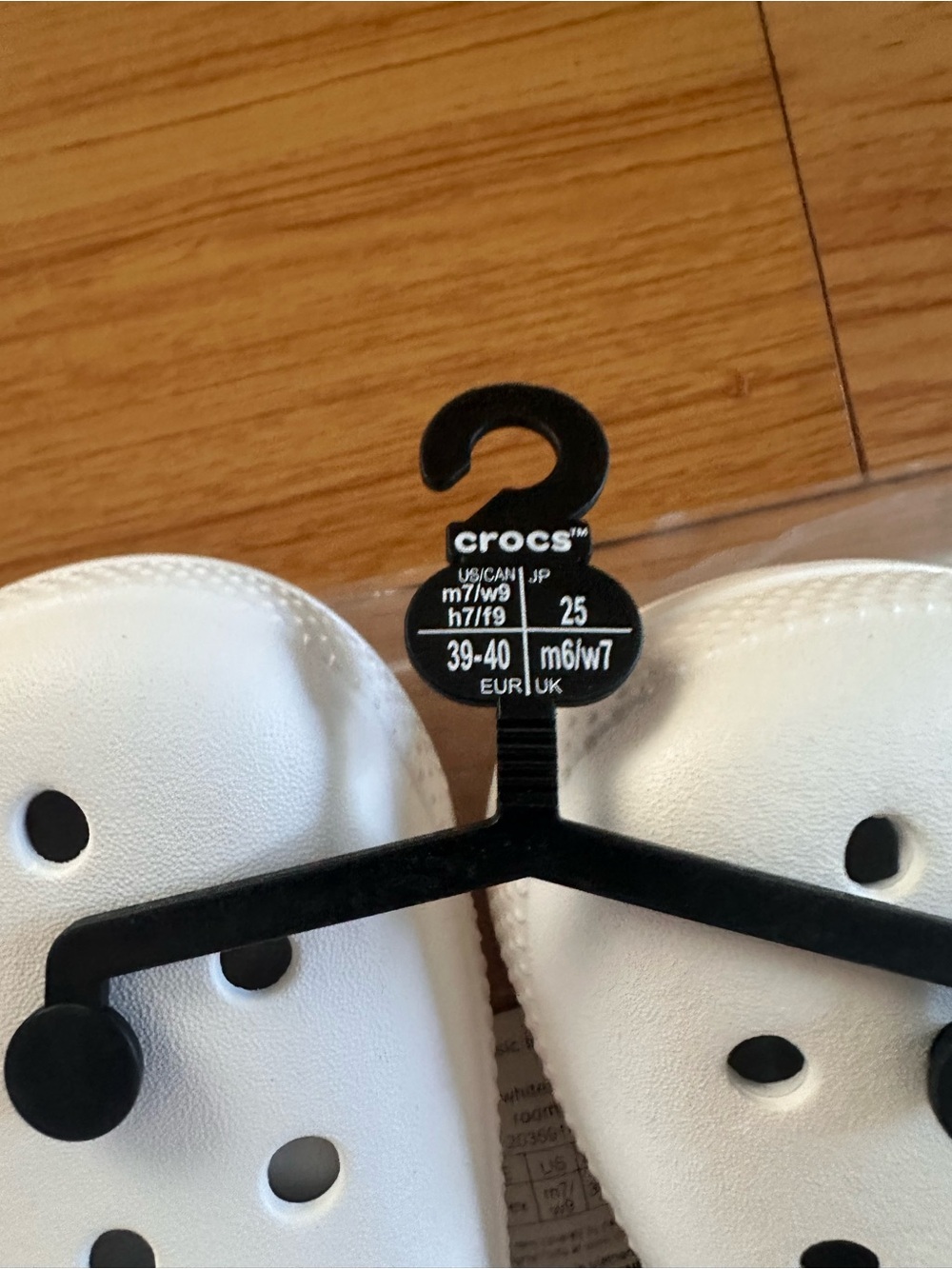 Crocs Classic Clogs in White and Black - Picture 6 of 6
